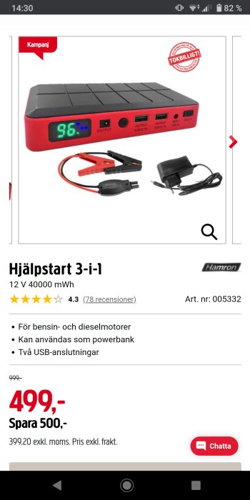 Portable jump starter and power bank for vehicles, red and black, with digital display, cables, and charger.