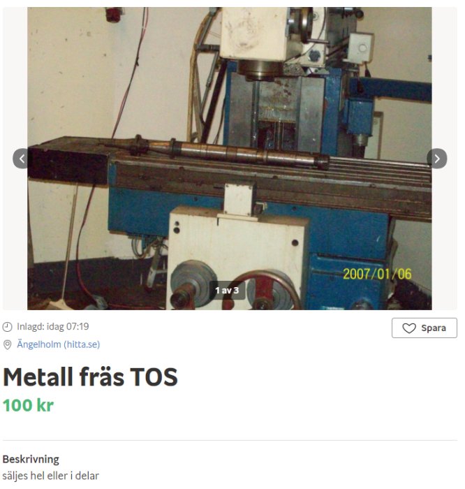 En begagnad metallfräs av märket TOS i ett verkstadsutrymme med datumstämpel från 2007.