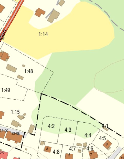 Detaljerad karta över fastighetsgränser med olika markfärg och streckade linjer.