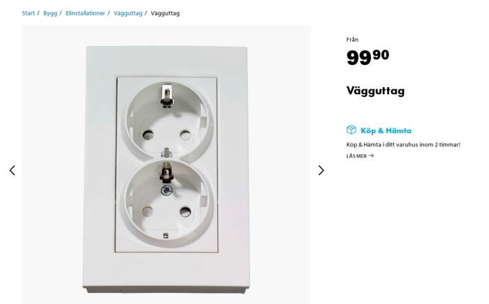 Dubbel vägguttag i vitt monterat på vit vägg, märkt med pris från en webbutik.