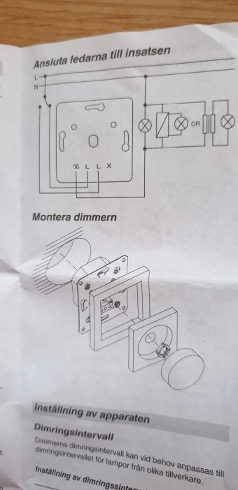 Kopplingsschema och monteringsanvisning för en dimmer på ett papper.