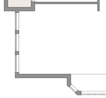 Schematisk ritning av en innervägg i ett rum, där väggens uppbyggnad kan vara föremål för diskussion om isolering och renovering.