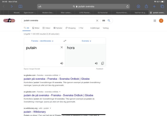 Skärmdump av en Google-översättning från franska "putain" till svenska "hora".