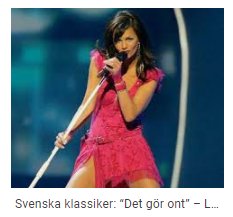 Artist uppträder på scen med mikrofon, referens till låten "Det gör ont".