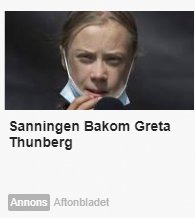 Ung flicka bakom en genomskinlig yta med allvarligt uttryck.