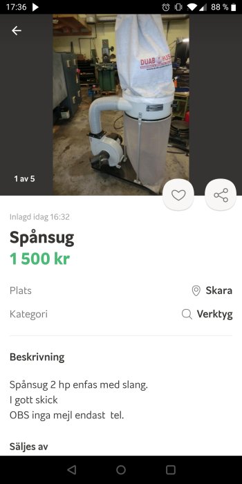 Begagnad spånsug med 2 hp enfasmotor och slang i verkstadsomgivning, märkt med Duab Husqvarna.