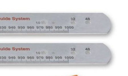 Två parallella linjaler med mätmarkeringar, märkta med 32 och 48, för ett bygg-guide system.