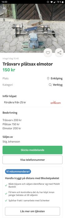 Åldrade verktyg på stenläggning bestående av trävarv och plåtsax med elmotor.