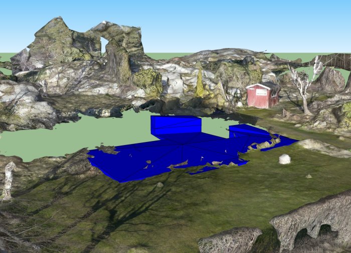 3D-modell av terräng med blåa markeringar som visar planerade schaktvolymen för ett byggprojekt.