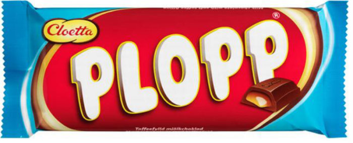 Förpackning av Cloetta Plopp chokladkaka med logotyp och synligt innehåll.