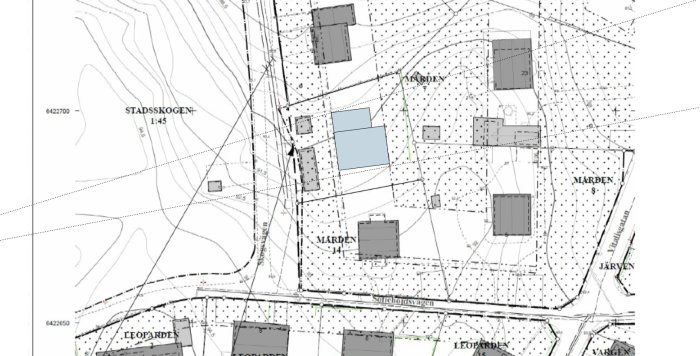 Tomtplan med markerad byggplats för hus och garage, och prickmark i villaområde.