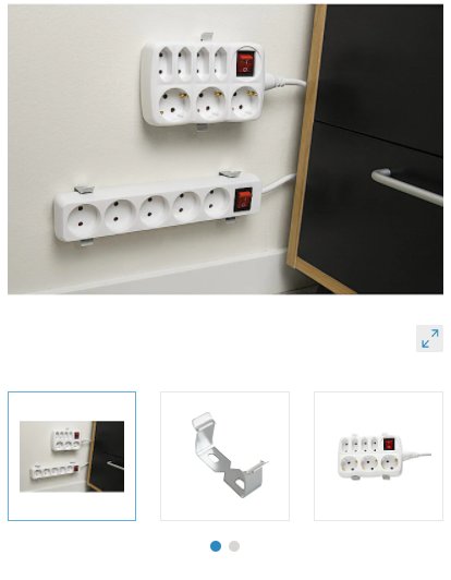 Grenuttag monterade på väggen under ett skrivbord med hjälp av metallklämmor som visas i produktbilder.