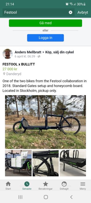 Lastcykel märkt med Festool och Bullitt logotyper, svart med gröna detaljer, parkerad utomhus.