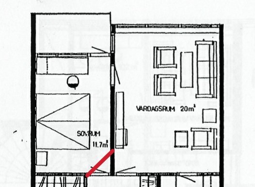 Ritning av en lägenhet med markerad bärande vägg mellan sovrum och vardagsrum.