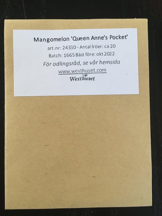 Fröpåse med Mangomelon 'Queen Anne's Pocket' från Wexthuset, information om artnummer och bäst före-datum.