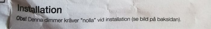 Närbild på installationsinstruktion som anger att "nolla" krävs vid installation.