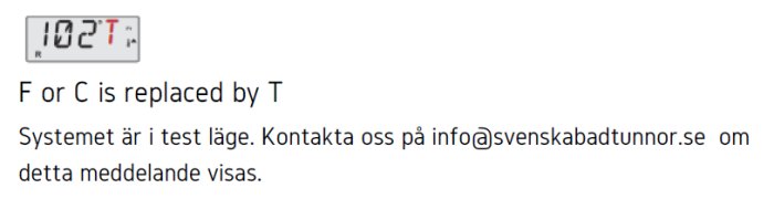 Digital display visar 102 grader med ett T-symbol och textvarning om testläge.