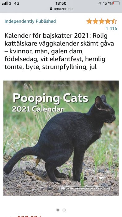 Svart katt som gör sina behov ute, med texten "Pooping Cats 2021 Calendar" nedanför.