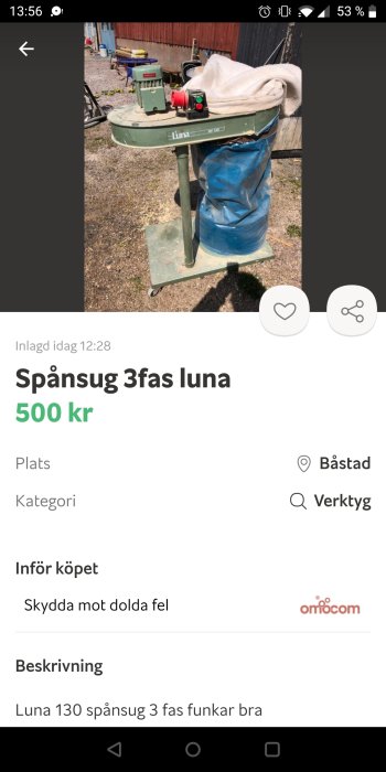 Begagnad Luna 130 spånsug utomhus, ansluten till tre faser, med tillhörande blå säck och vit duk ovanpå.