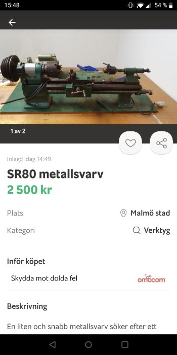 Grön SR80 metallsvärv placerad på ett bord med skärande verktyg monterade och redo för användning.