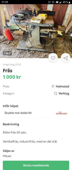 En äldre, använd fräs med tillbehör i en verkstadslokal, till salu för 1 000 kr.