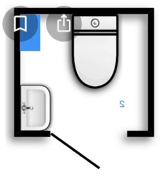 Schematisk ritning av WC-layout i källare med markerade avlopp och planerade väggar.