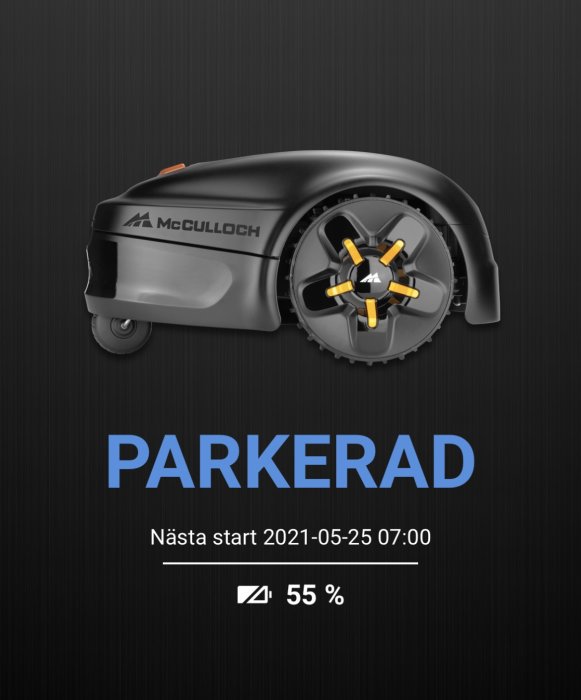 Robotgräsklippare parkerad med statusindikator och batterinivå på displayen.