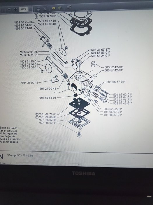 Exploded view diagram of machine parts with labeled components on a computer screen.