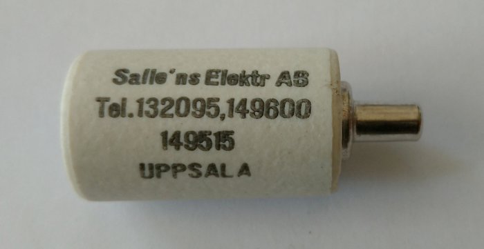 Säkring med reklam för Sälle'ns Elektr AB, kontaktinformation och Uppsala-notering.