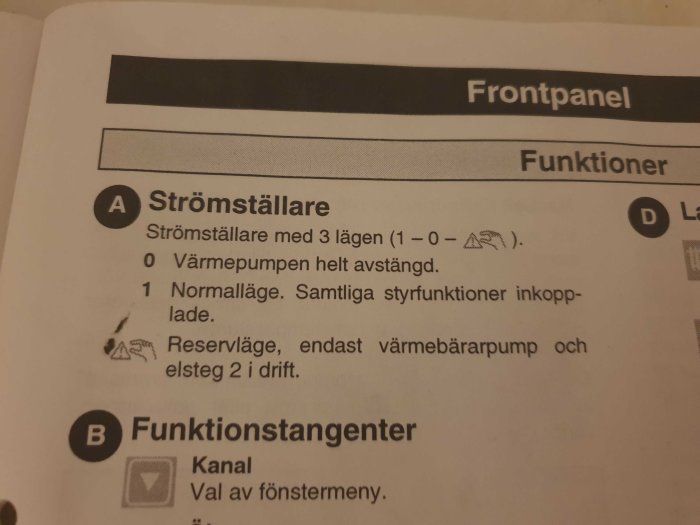 Närbild av instruktionsmanual för värmepump med beskrivning av strömbrytare och funktionsinställningar.