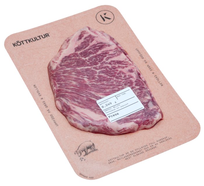 Iberico Presa köttbit på märkt förpackning från KÖTTKULTUR med tydlig marmorering.