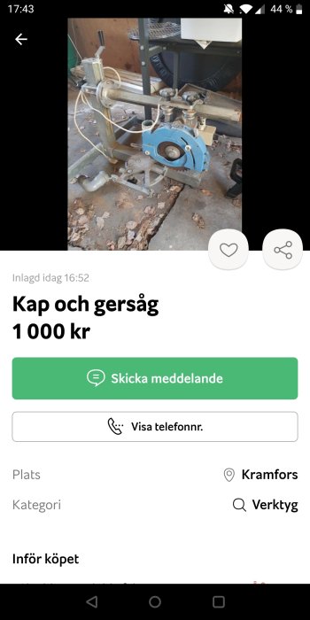 Begagnad kap och gersåg till salu, placerad på ett smutsigt betonggolv.