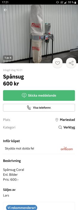 Spånsug med vit filterpåse och galvaniserade ståldelar mot vit väggbakgrund.