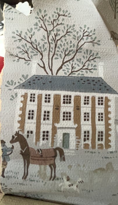 Tapetbit med illustration av ett hus, träd och en häst framför en person.