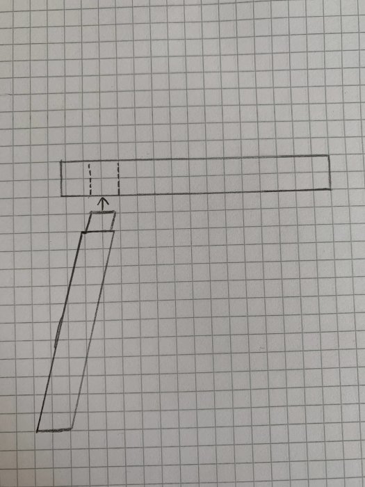 Handritad skiss på rutigt papper som visar en L-formad konstruktion eller fog.