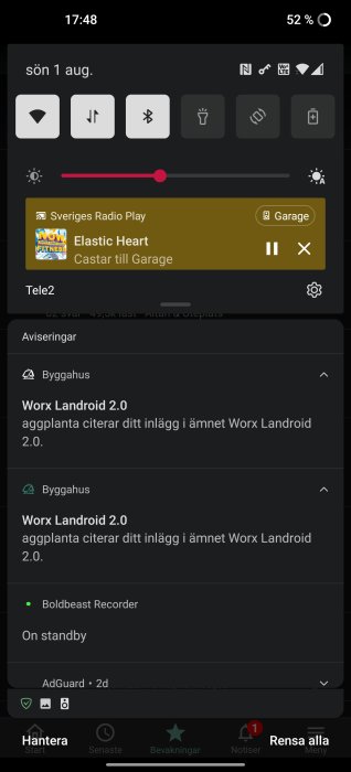 Android-skärm med dubbla notiser från Bygghus-appen och andra programvaruikoner.