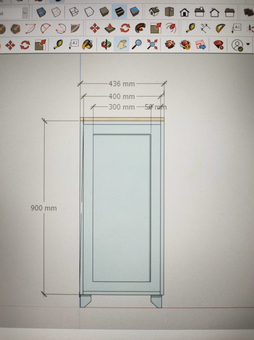 Ritning av ett skåp med måttangivelser på en datorskärm.