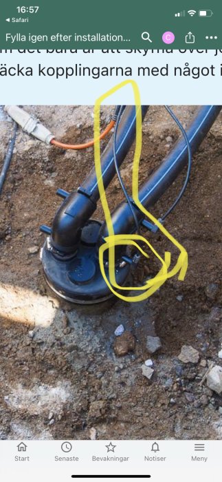 Underjordsinstallation med rör och kablar markerade med en gul cirkel för att peka ut ett specifikt stift.