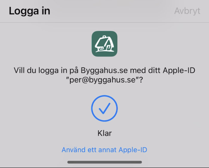 Inloggningsprompt för Byggahus app med Apple-ID autentisering och knapp för bekräftelse.