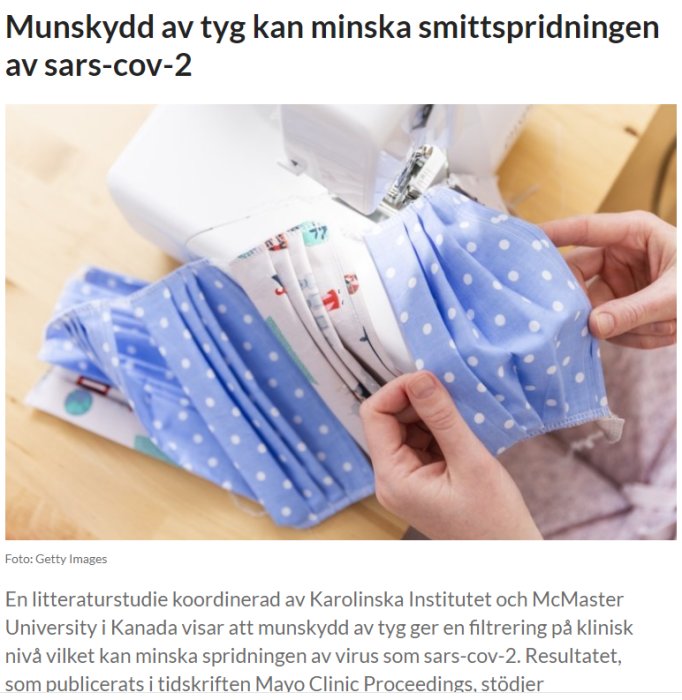 Tygmunskydd med blått prickigt mönster sys på symaskin.