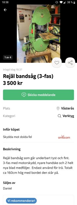 Grön Walker-Turner bandsåg med bord i en verkstad, 3-fas modell, motorskydd ingår.