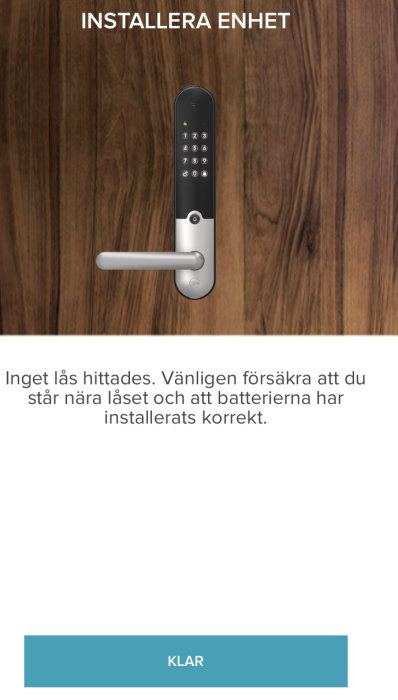 Yale digitalt dörrlås på en trädörr och en mobilapp som visar att låset inte hittas under installation.