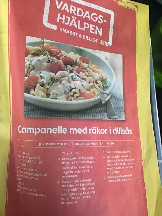 Recept på campanelle med räkor i dillsås från tidning, ingredienslista och tillagningsinstruktioner.