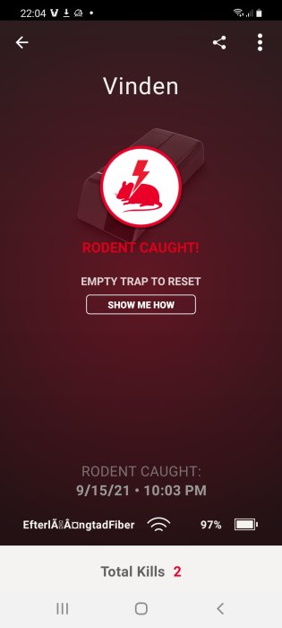 Smartphone-skärm som visar en gnagare fångad i en elektronisk fälla med texten "RODENT CAUGHT!".