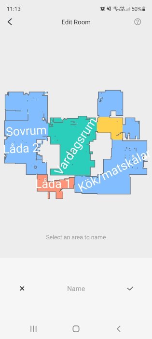 Skärmdump av en redigeringsvy för rumsindelning med märkta områden: Sovrum, Vardagsrum och Kök.