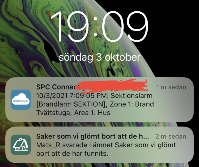 Mobilskärm visar notiser med brandlarm från SPC Connect och missade påminnelser.