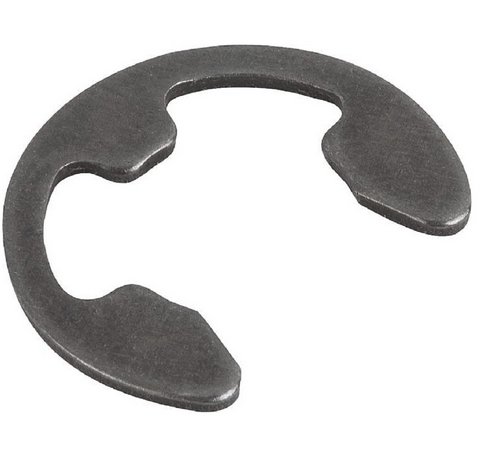 Metallisk halvbricka med öppning, använd för att låsa hjulet på en axel.