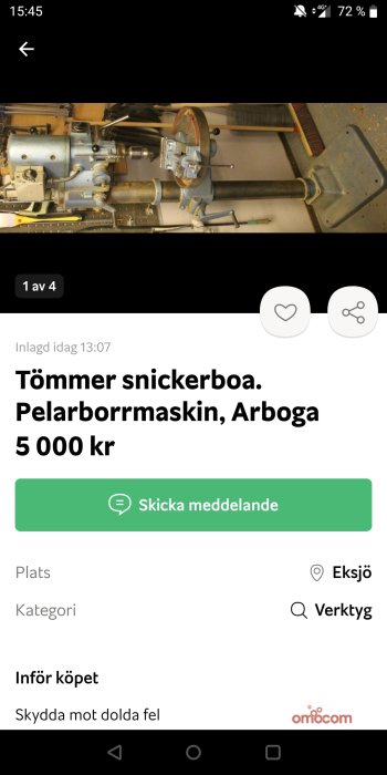 Begagnad pelarborrmaskin i blått och silver på ett snickeribord till salu.