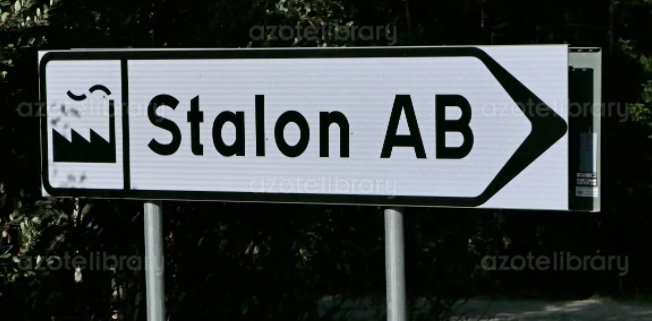 Vägskylt med texten "Stalon AB" och en pil som pekar åt höger.