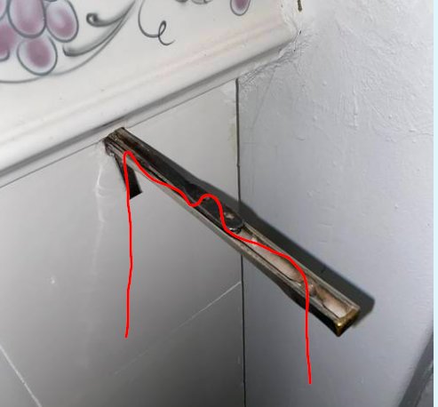 Spjälled (glidränna) med markerade linjer som visar två sätt att dra kedjan.